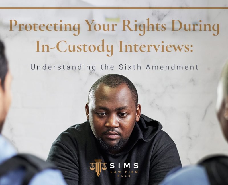 Man in police custody during an interrogation, representing the importance of invoking Sixth Amendment rights