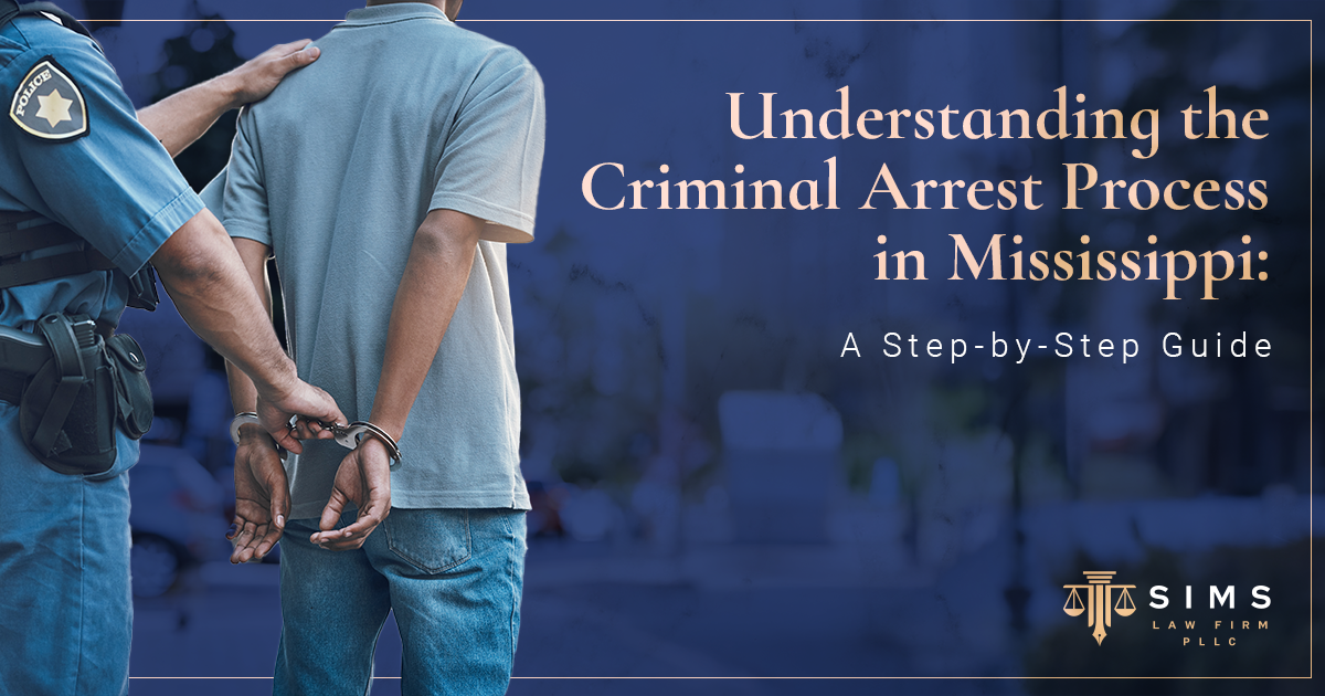 Mississippi police officer arresting a man in handcuffs, symbolizing the criminal arrest process explained by Sims Law Firm in Ridgeland.